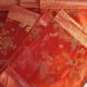 Set of 6 small table napkins in red brocade.