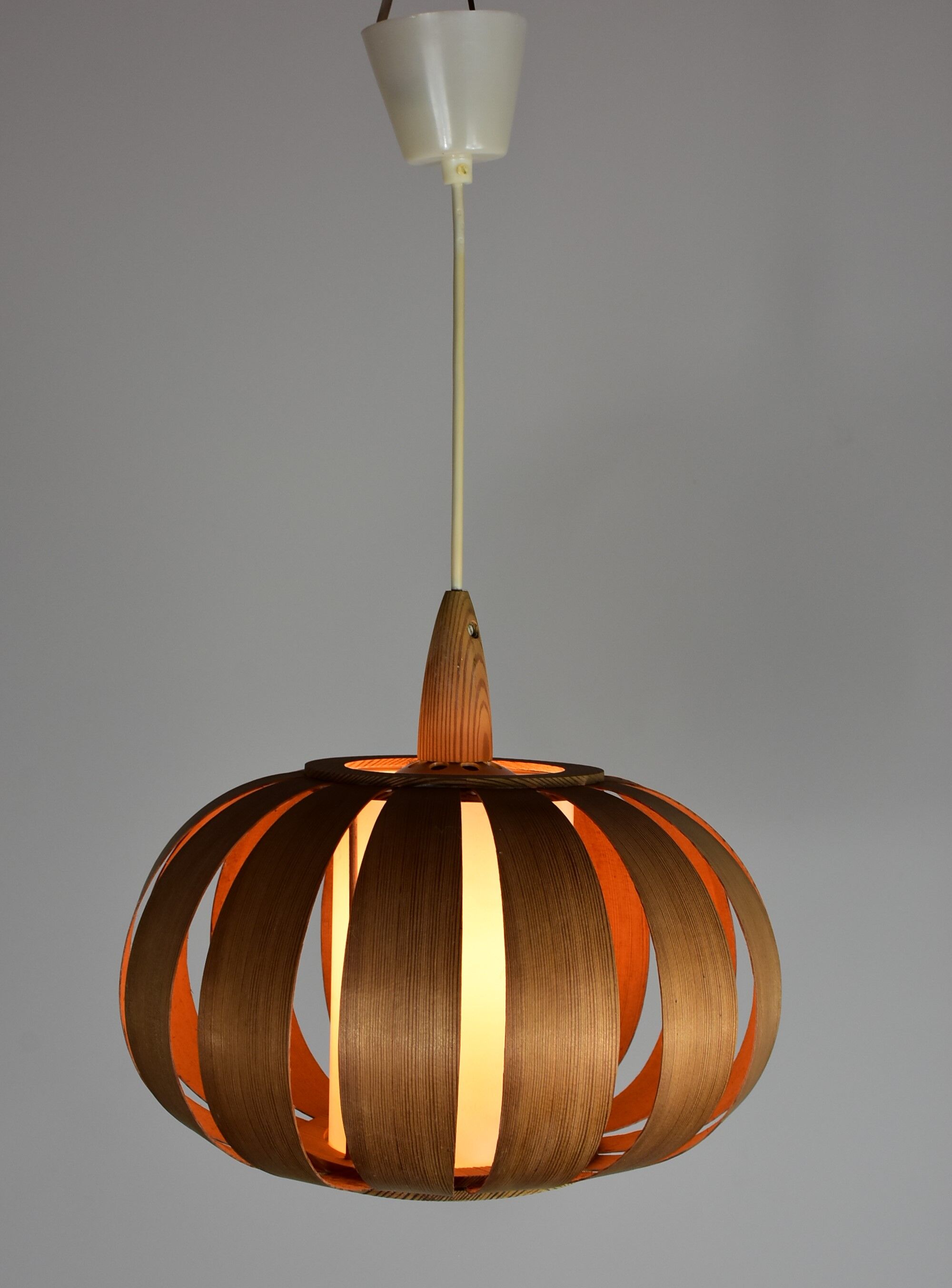 Scandinavian-style wooden pendant light.
