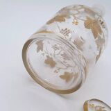 Old crystal carafe with golden decoration