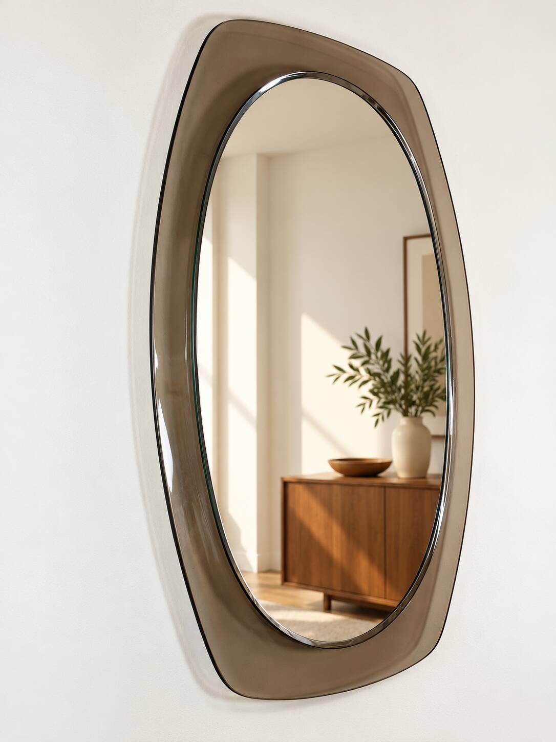Vintage mirror with smoked glass frame from the 1970s.