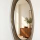 Vintage mirror with smoked glass frame from the 1970s.