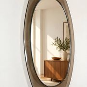 Vintage mirror with smoked glass frame from the 1970s.