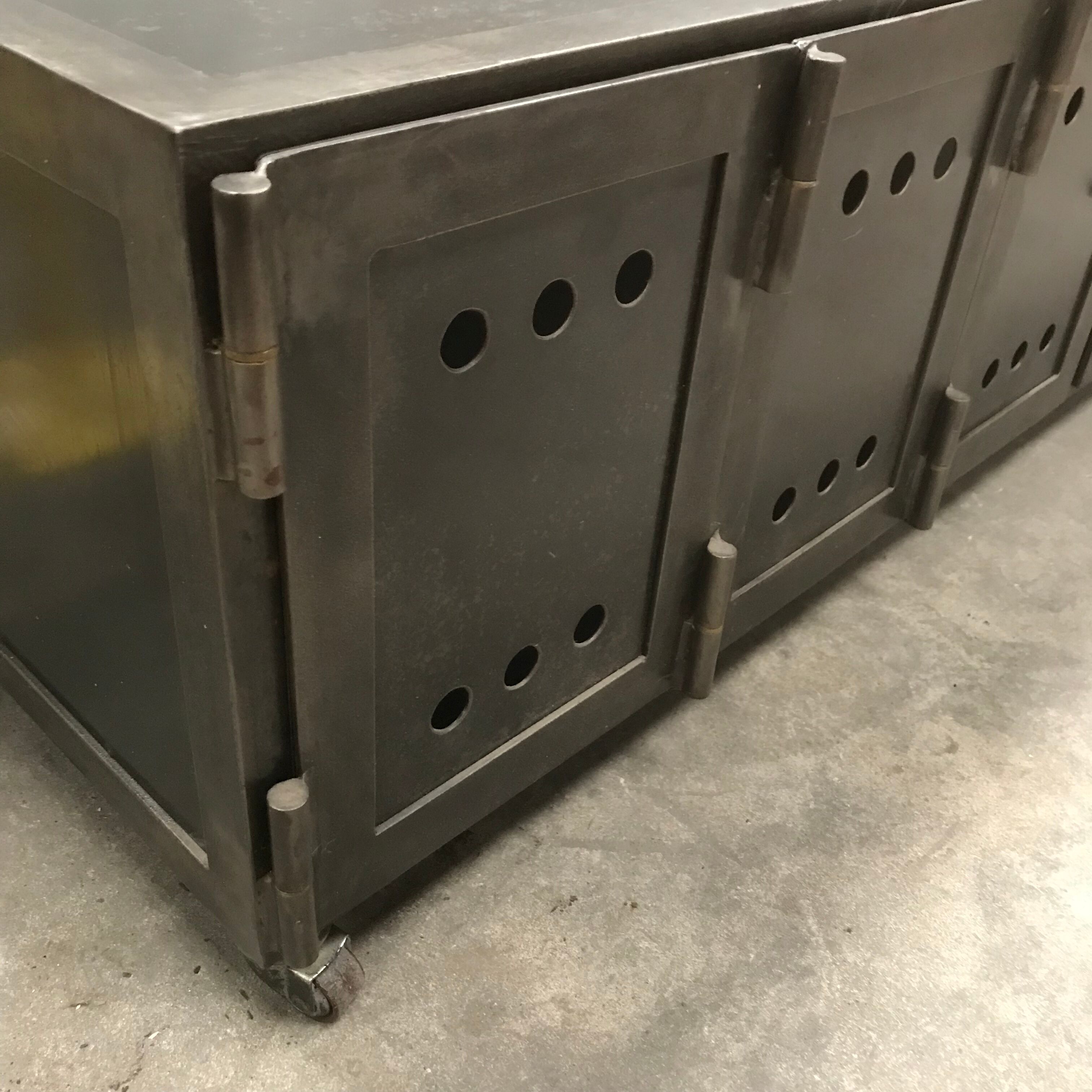 TV stand with natural steel accordion doors