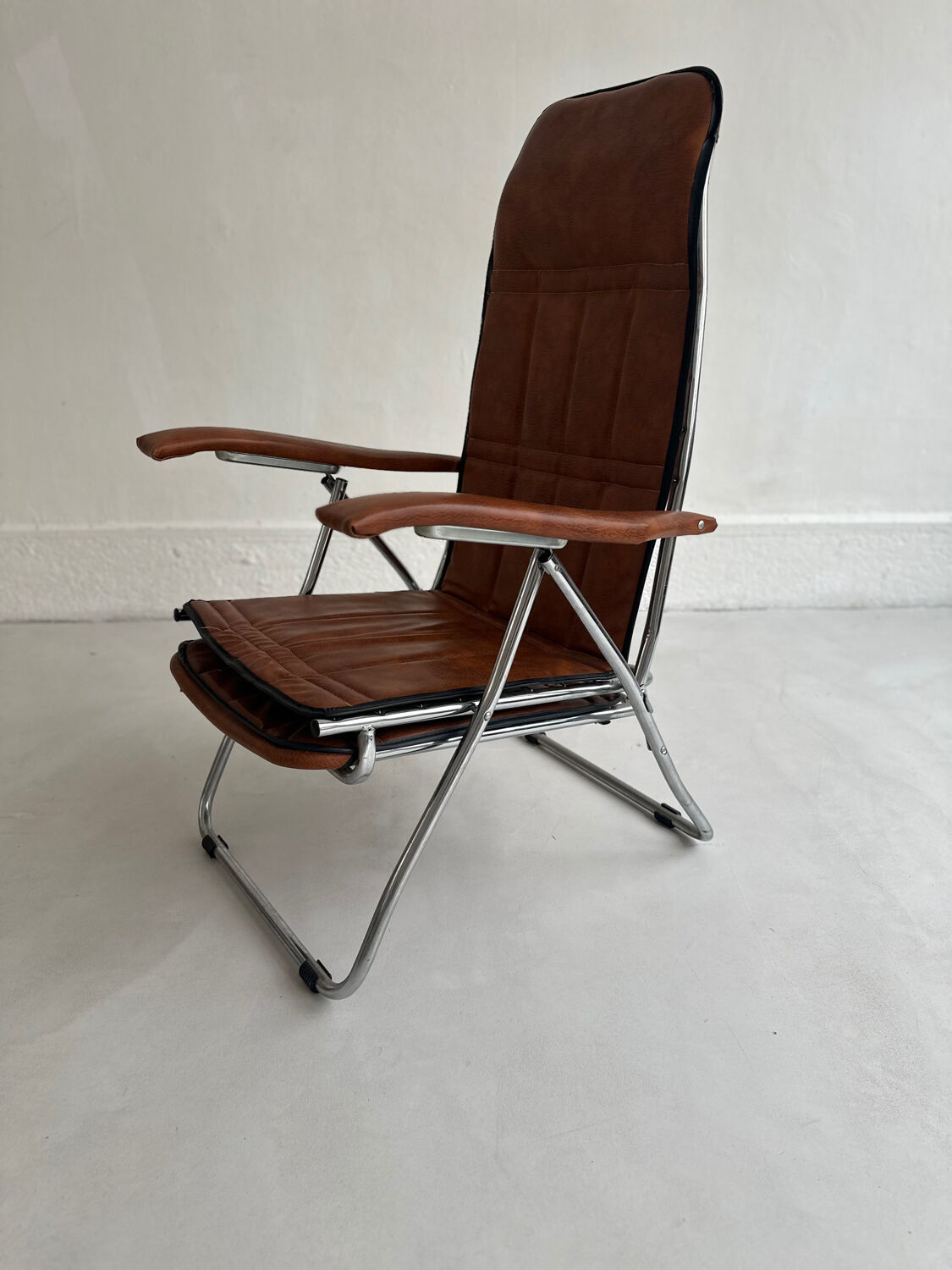 Authentic vintage reclining armchair