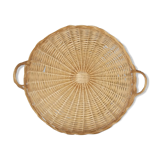 Round wicker dish with handles