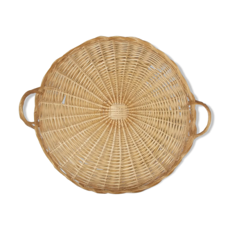 Round wicker dish with handles