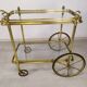 Vintage brass bar trolley service