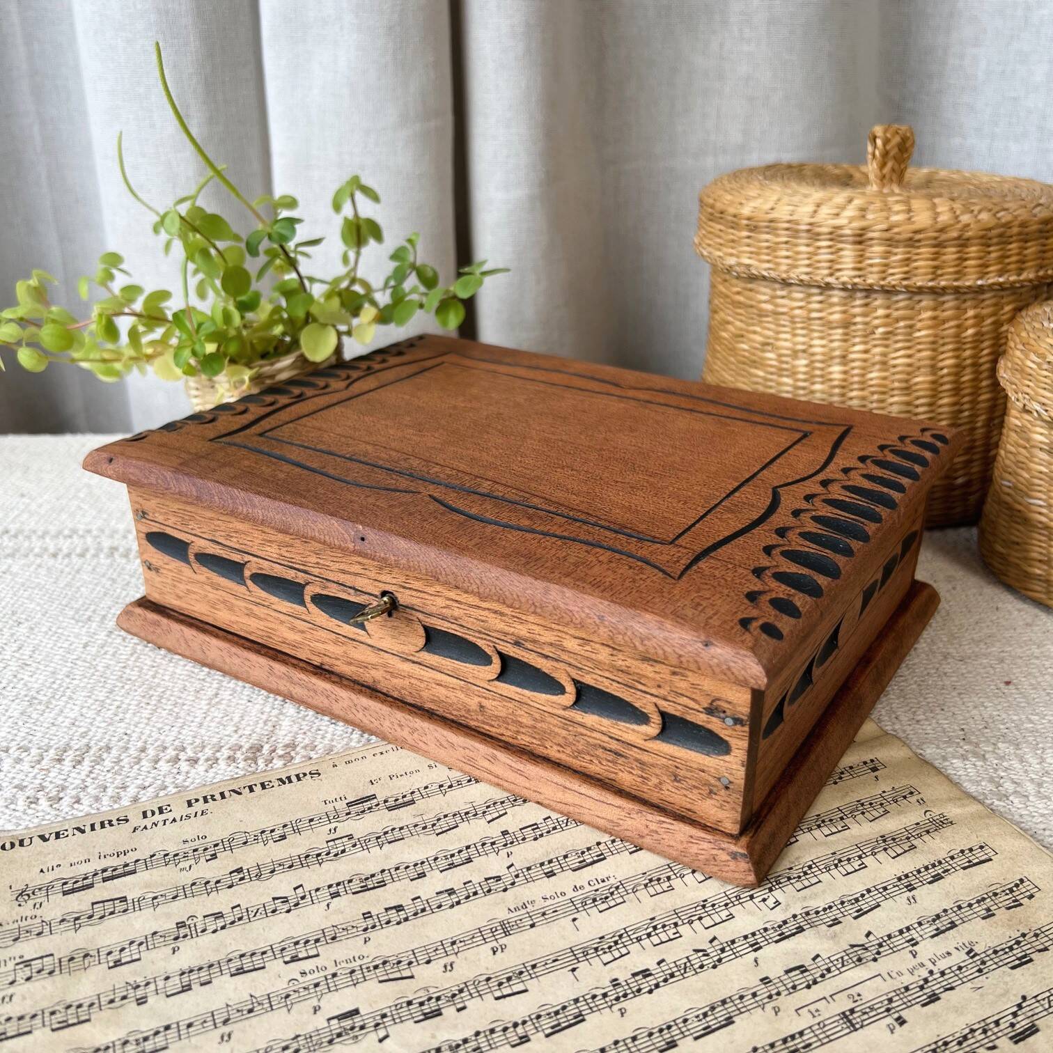Carved wooden box with key