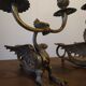 Pair of candlesticks with old chimera dragons hands