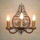 French triple wall sconce in wrought iron, early 20th century.