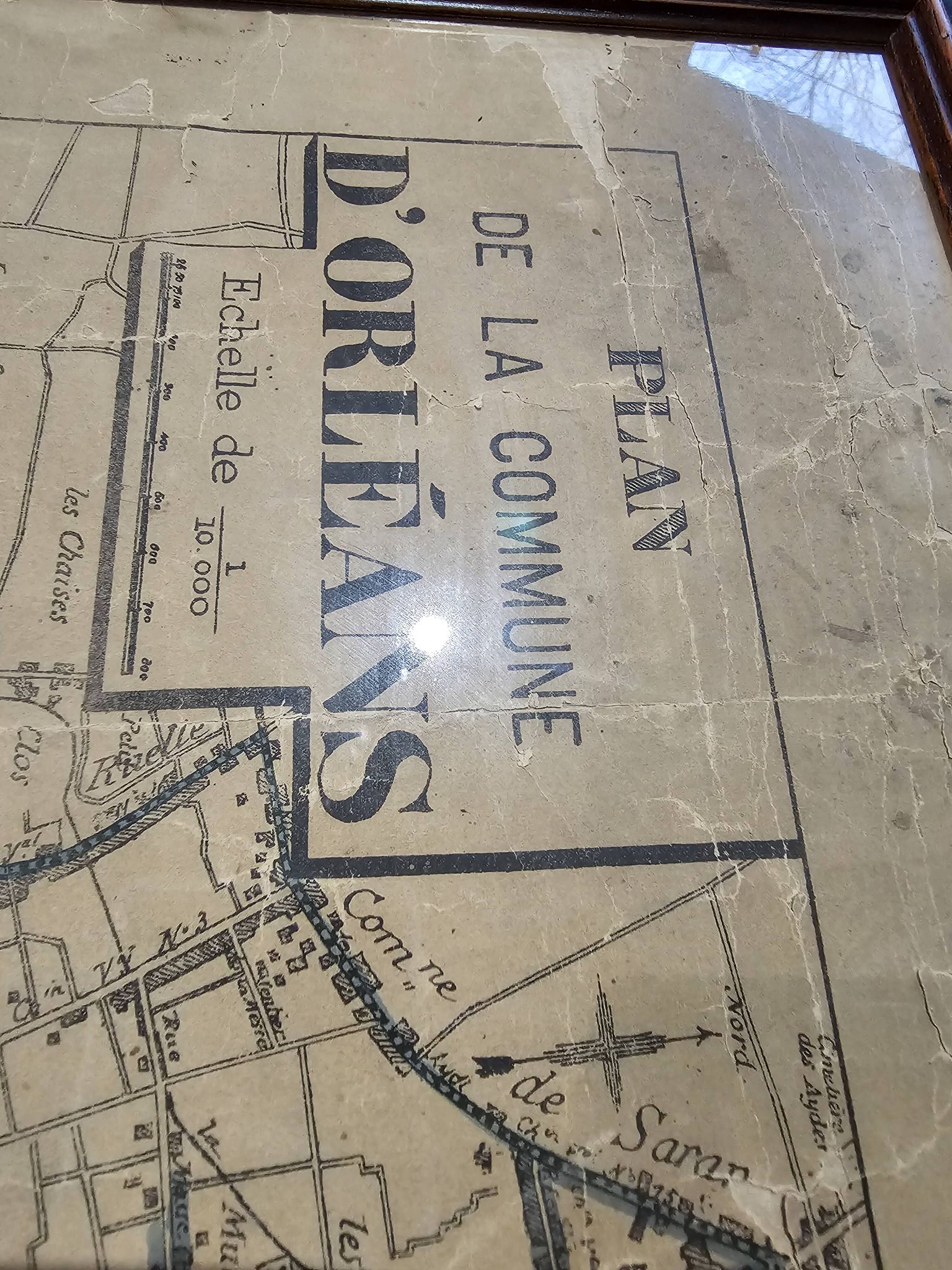 Old map of Orléans under glass frame