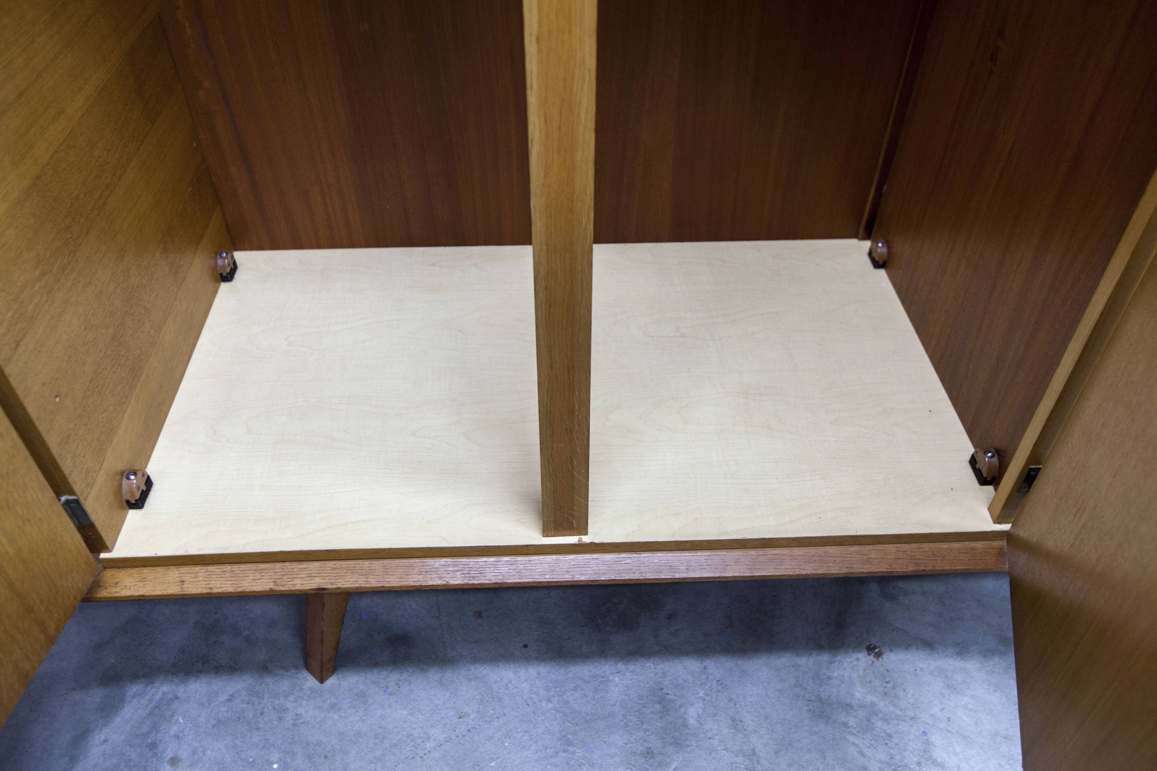 French wardrobe with tapered legs, 3 doors, 1 mirror (27*130), and 1 drawer.