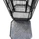 Old black metal birdcage from the early 20th century.