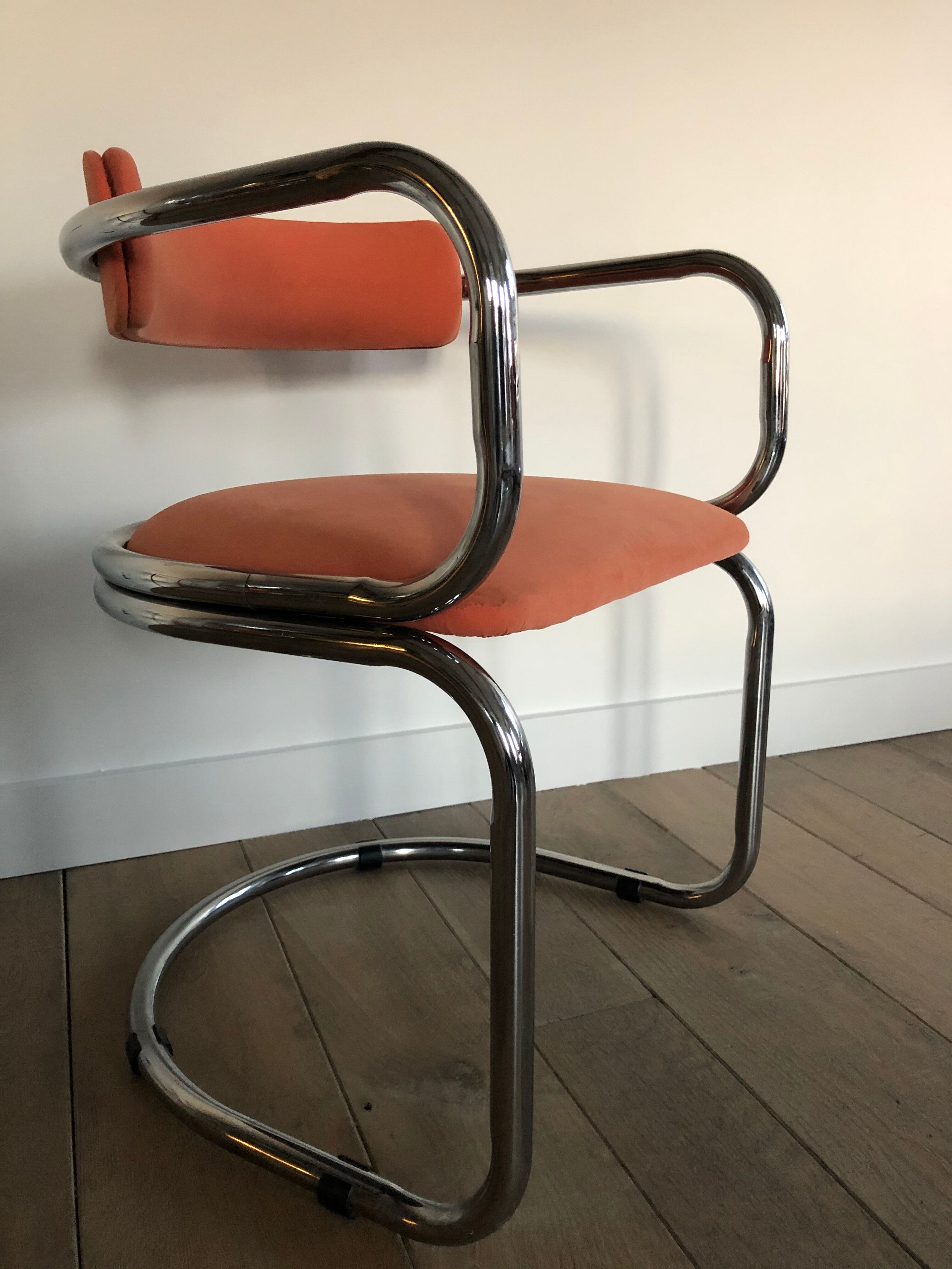 Victoria chair 70s chrome structure and terracotta-colored alacantara fabrics