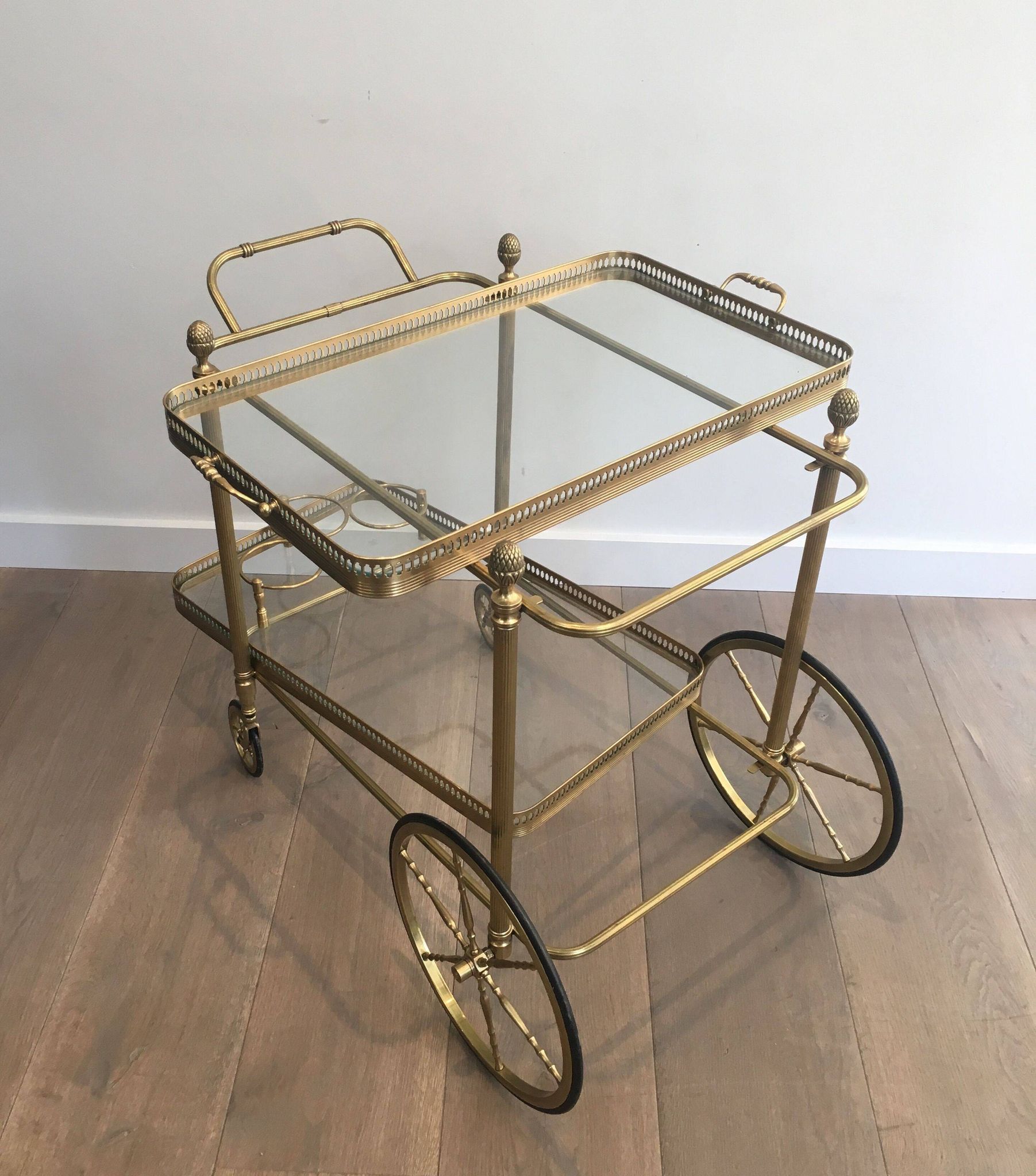 Neoclassical brass rolling table from Maison Baguès