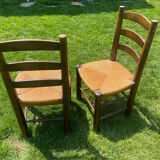 Pair of Georges Robert straw chairs
