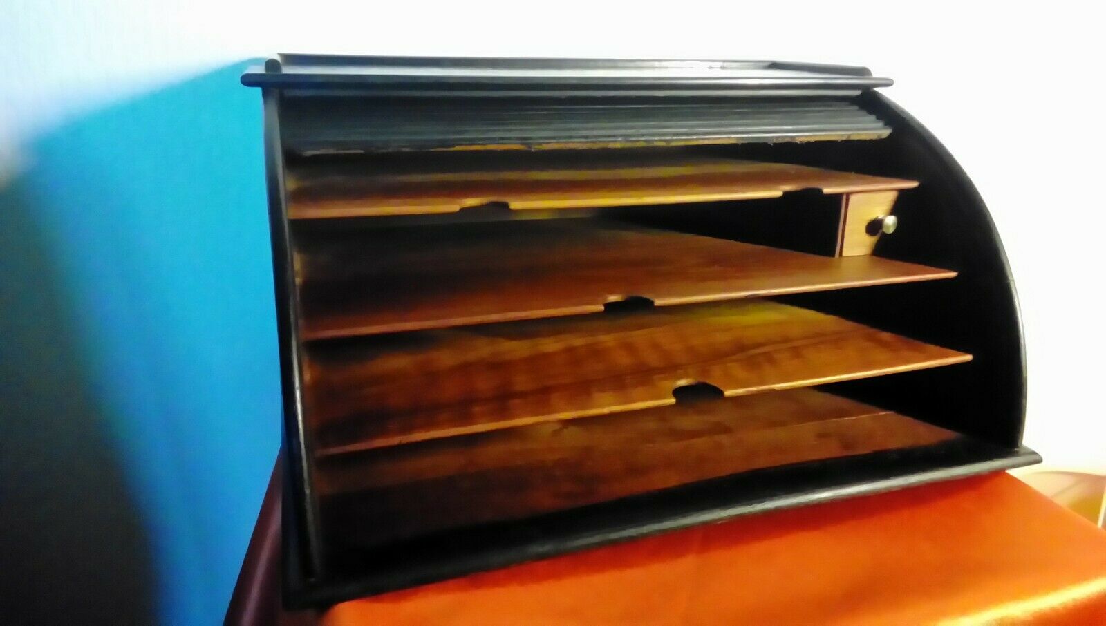 Blackened wooden curtain file mail tidy
