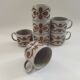 Sept tasses à déjeuner en grès 70s