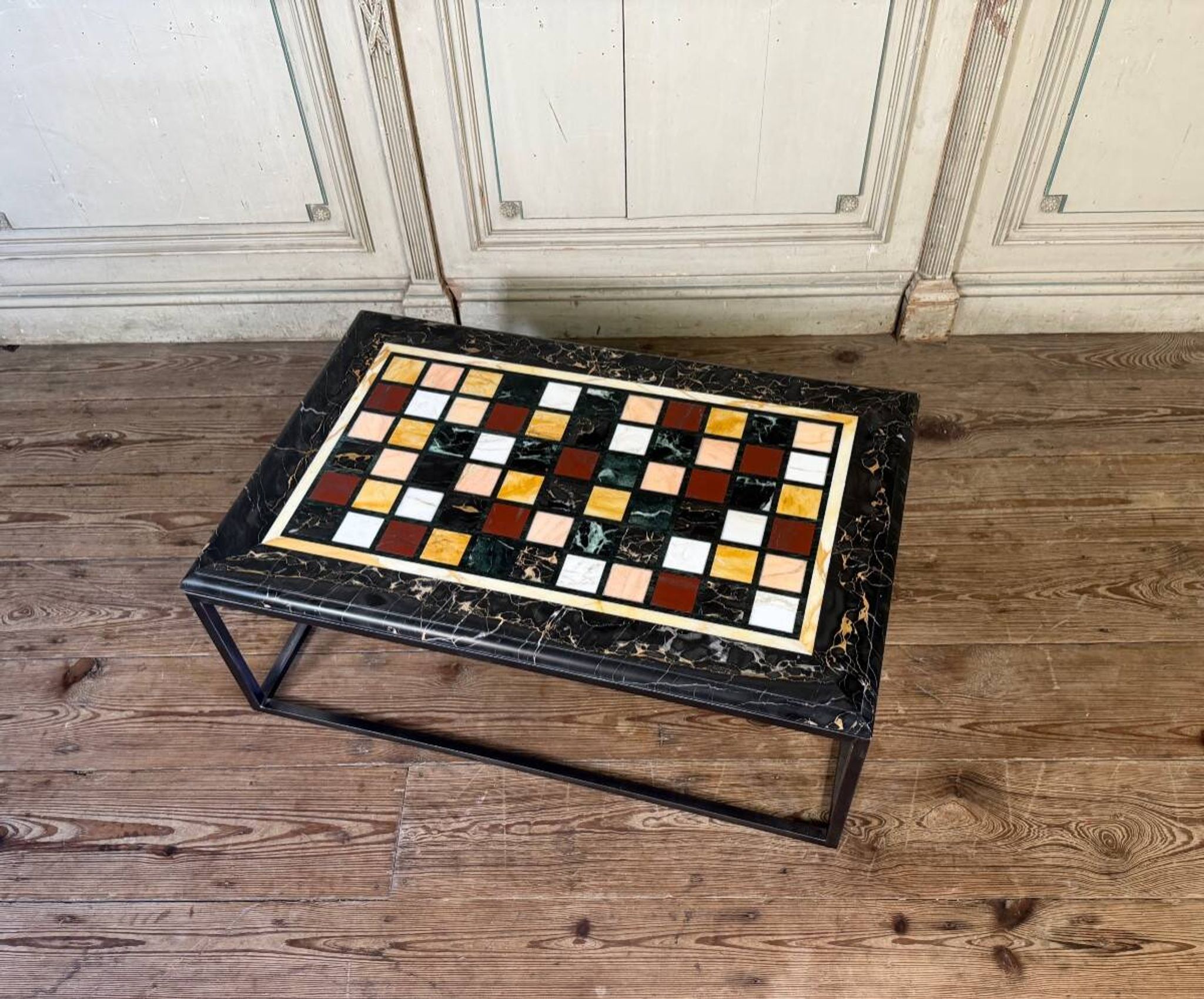 Coffee table, marble samples, custom metal base.