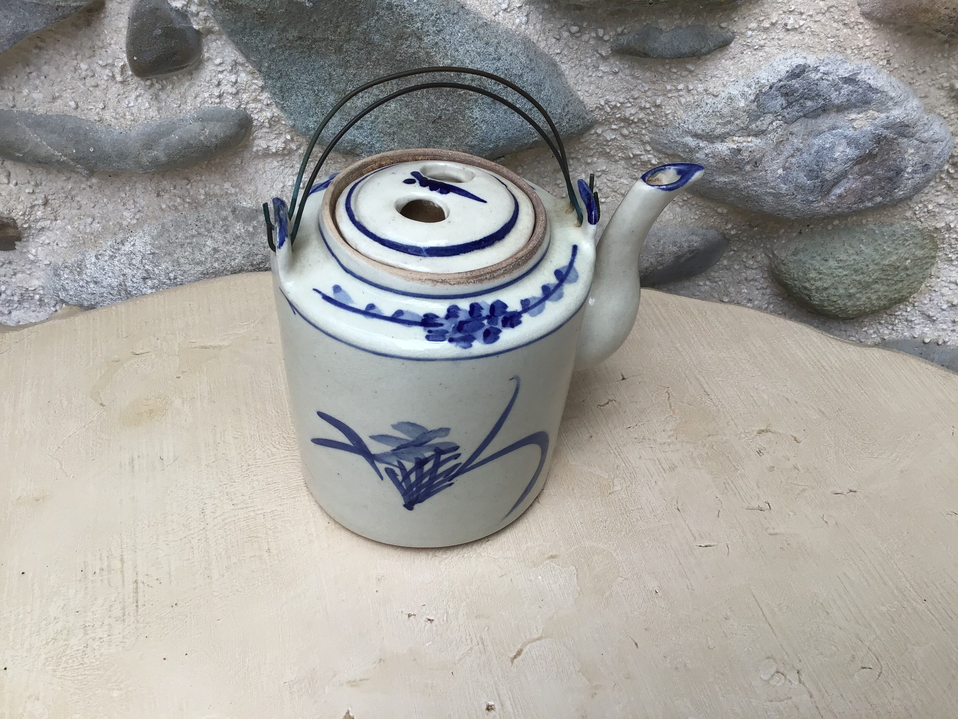 Beige and blue teapot