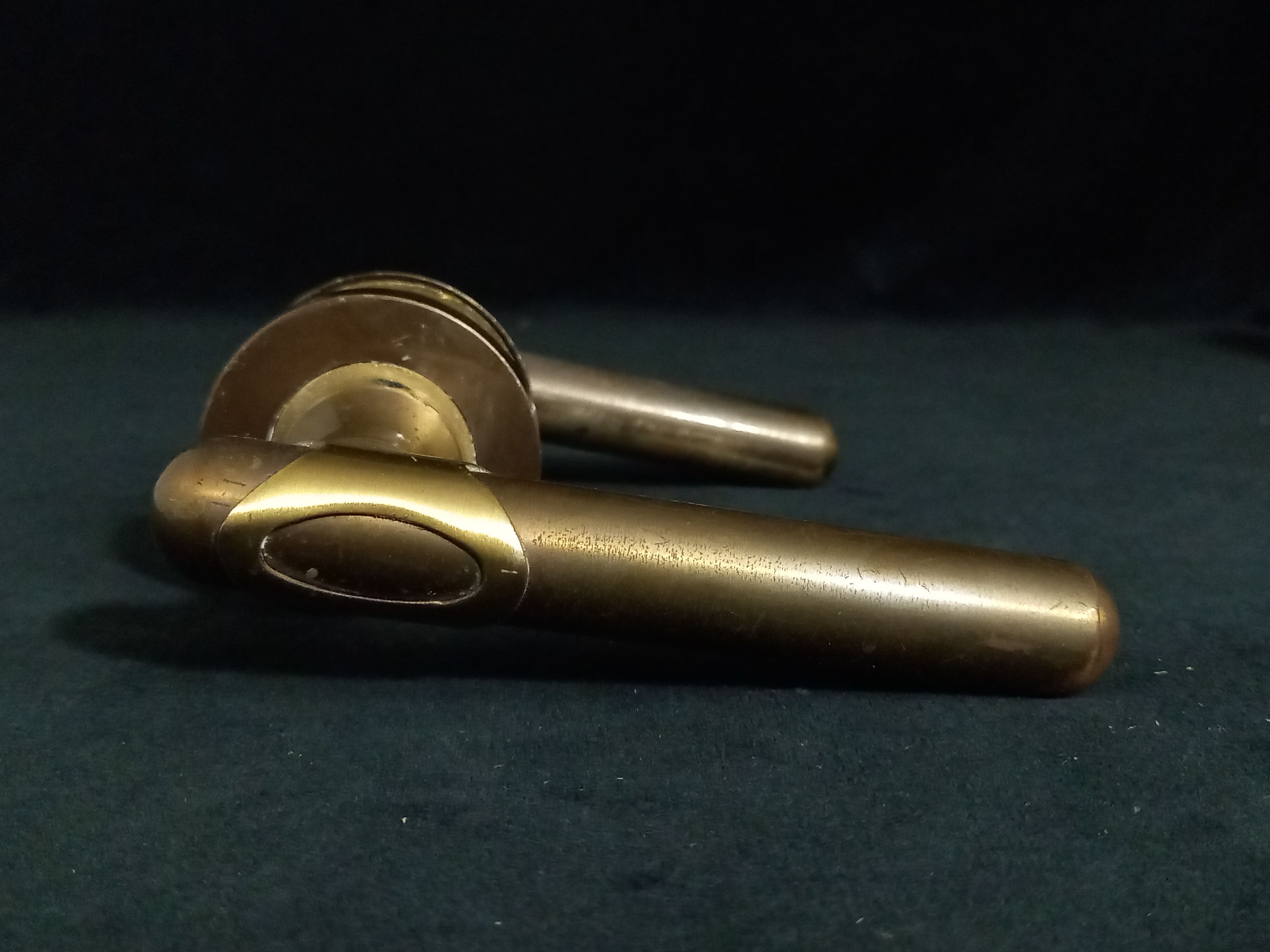 Four pairs of brass door handles with key plates