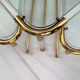 Coffee table and its 4 associated nesting tables in plexiglass and gold metal