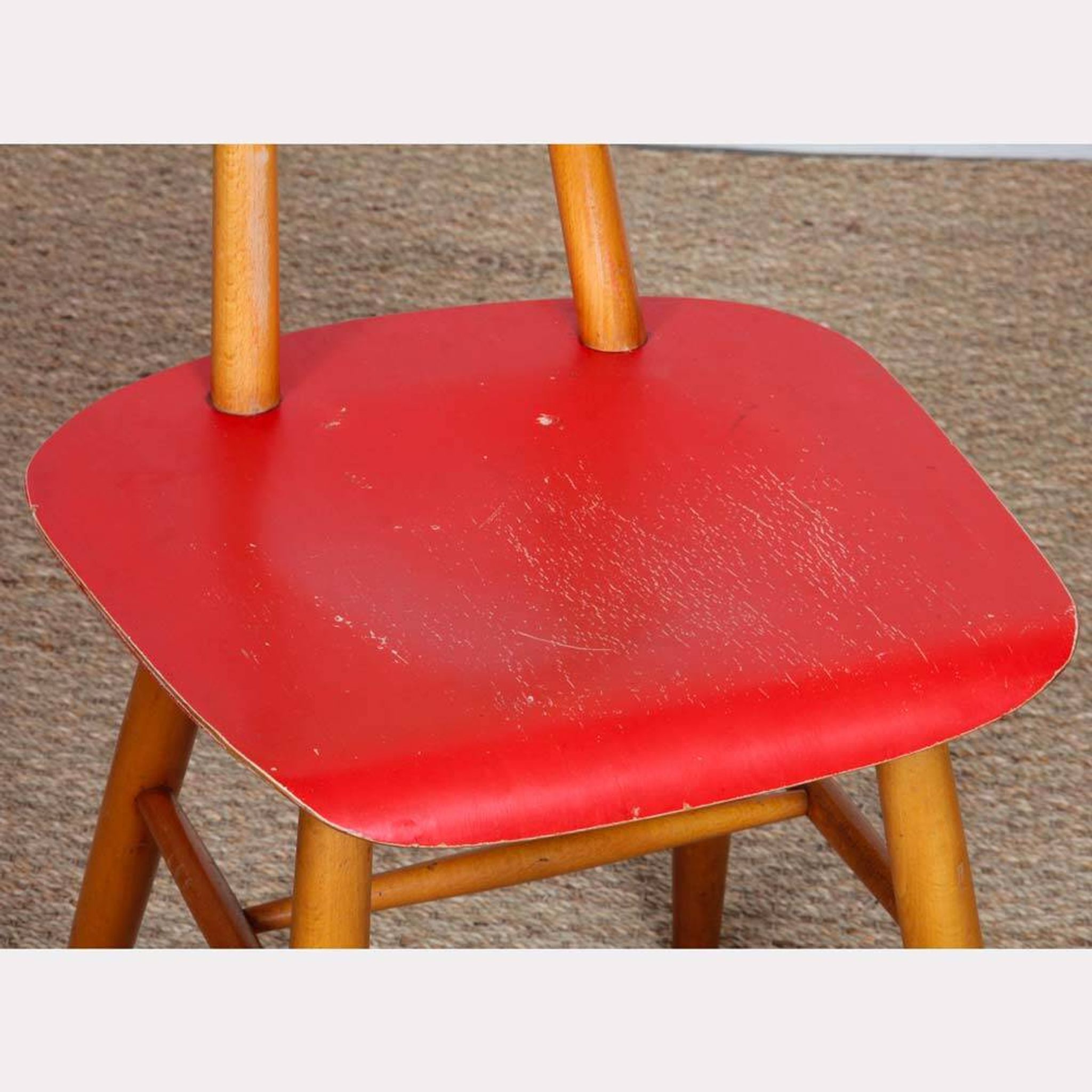 Red chair produced by Ton in the 1960s