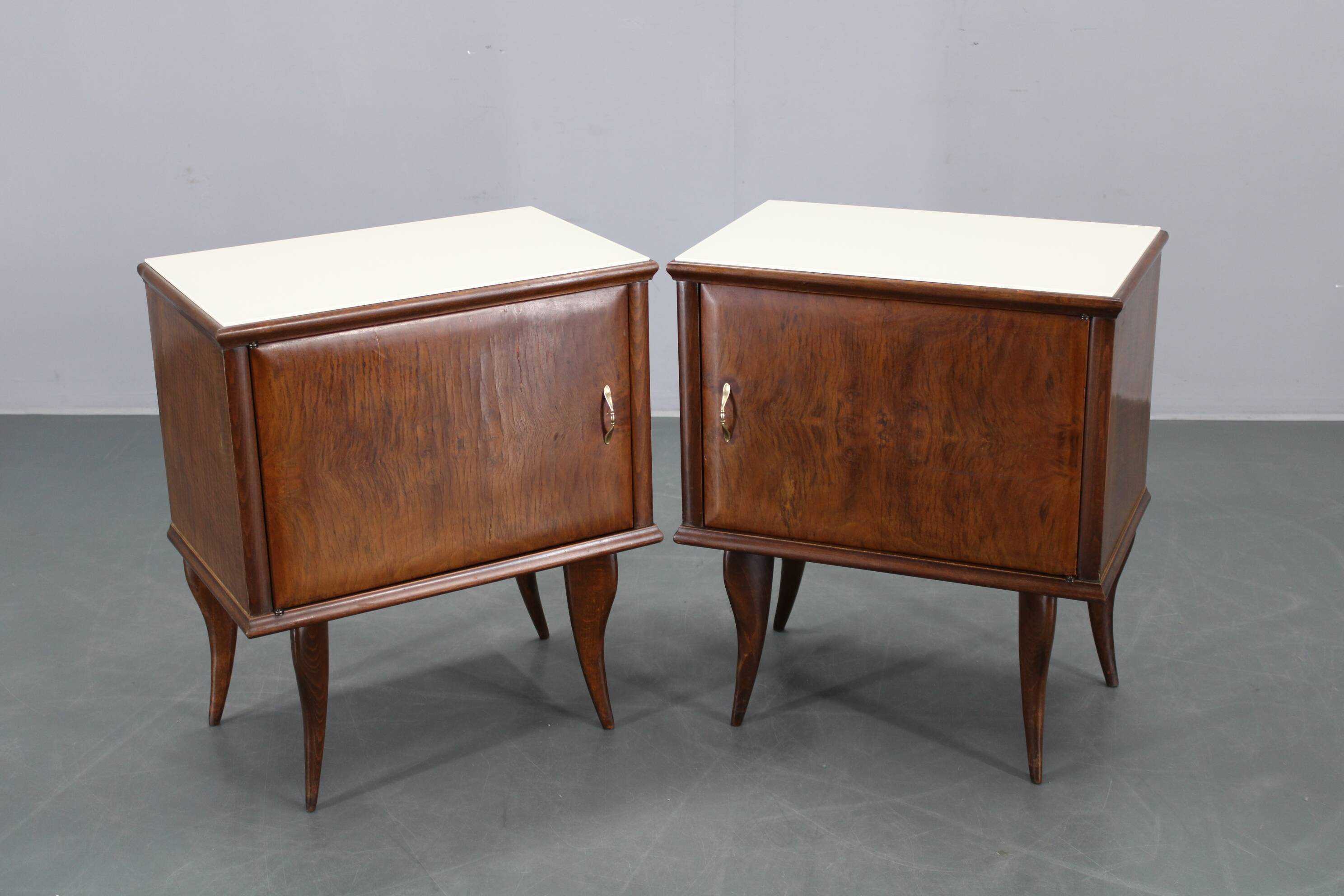 Pair of mid-century Italian walnut nightstands with glass top, 1950s