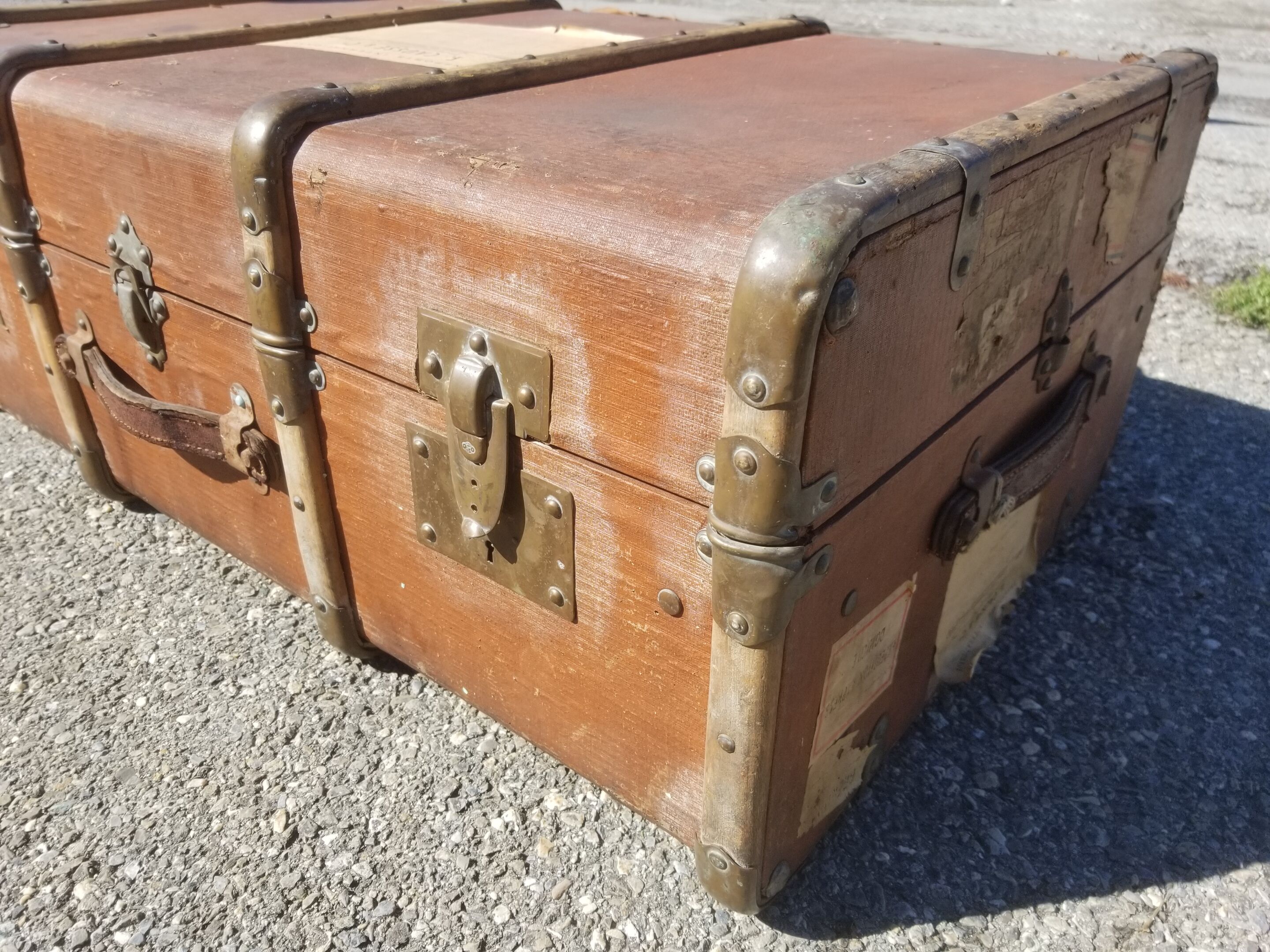 Old travel trunk made of wood and brass