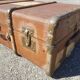 Old travel trunk made of wood and brass