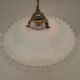 Old suspension, said rises and falls with serrated white opaline