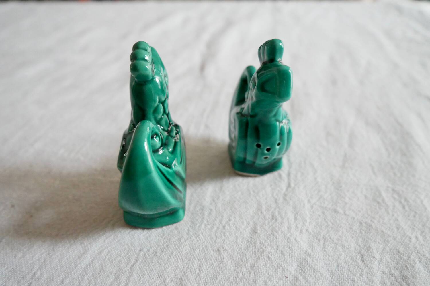 Slush salt and pepper shakers in the shape of a green rooster