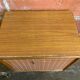 Vintage wooden storage cabinet with shelves