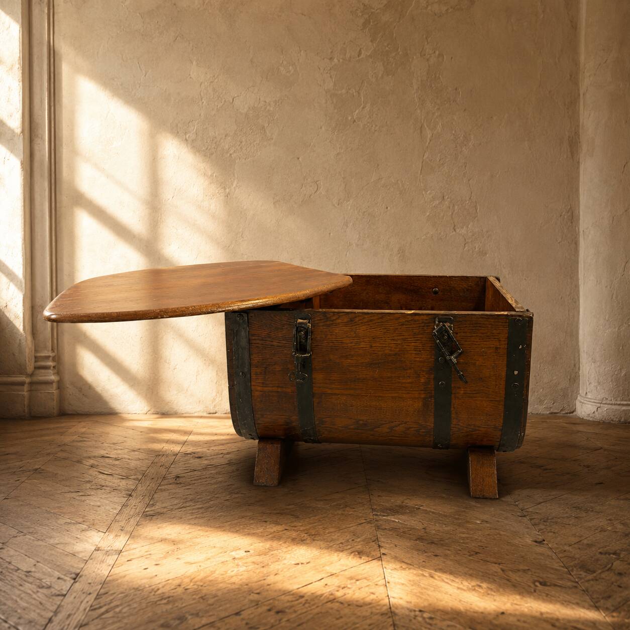 Oak barrel-shaped storage chest with black metal straps, 1930s-1940s.