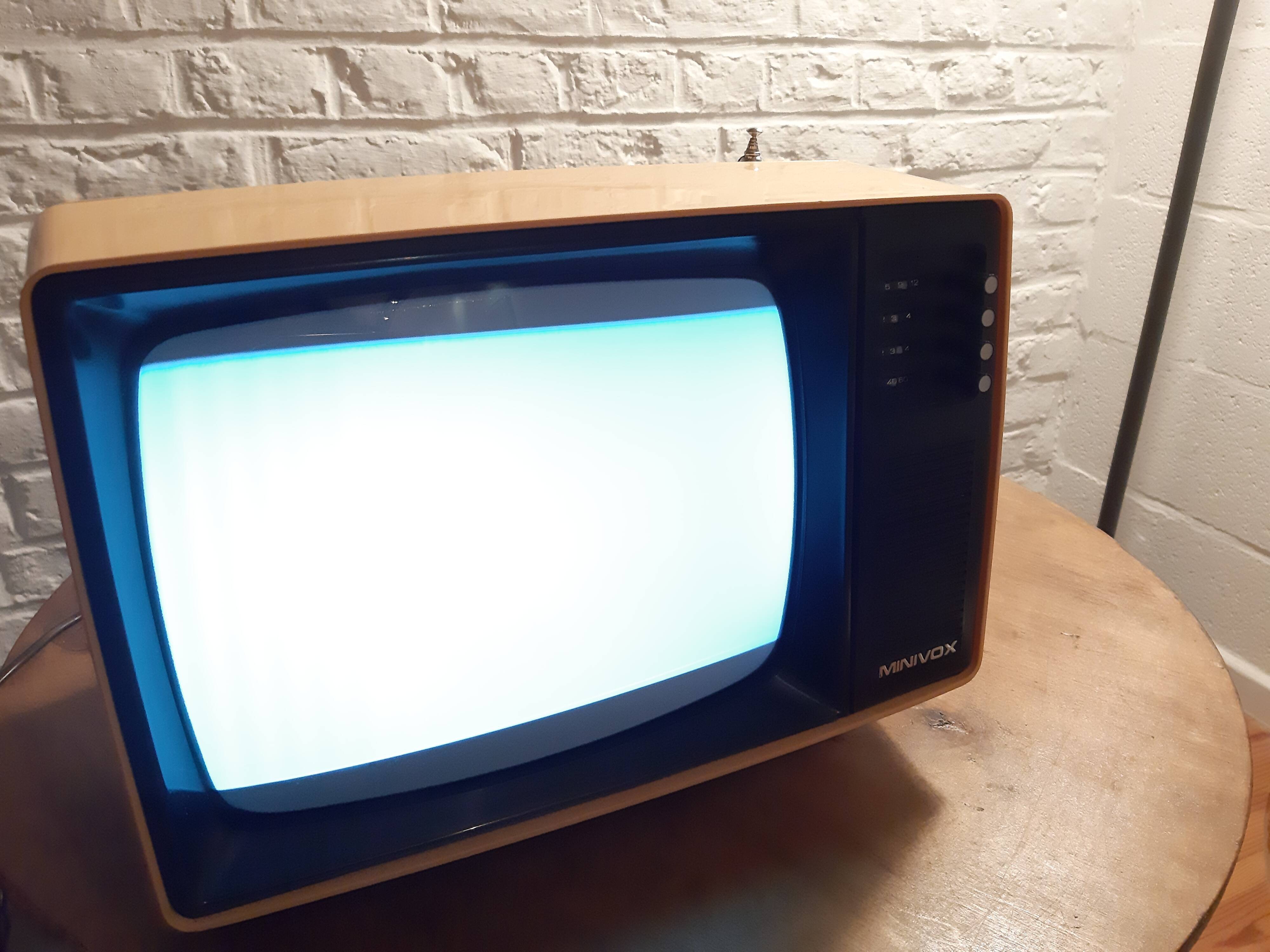 Yellow minivox vintage tv