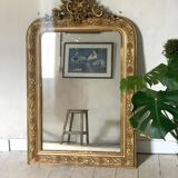 Golden fireplace mirror with pediment