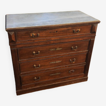 Old chest of drawers with white marble top
