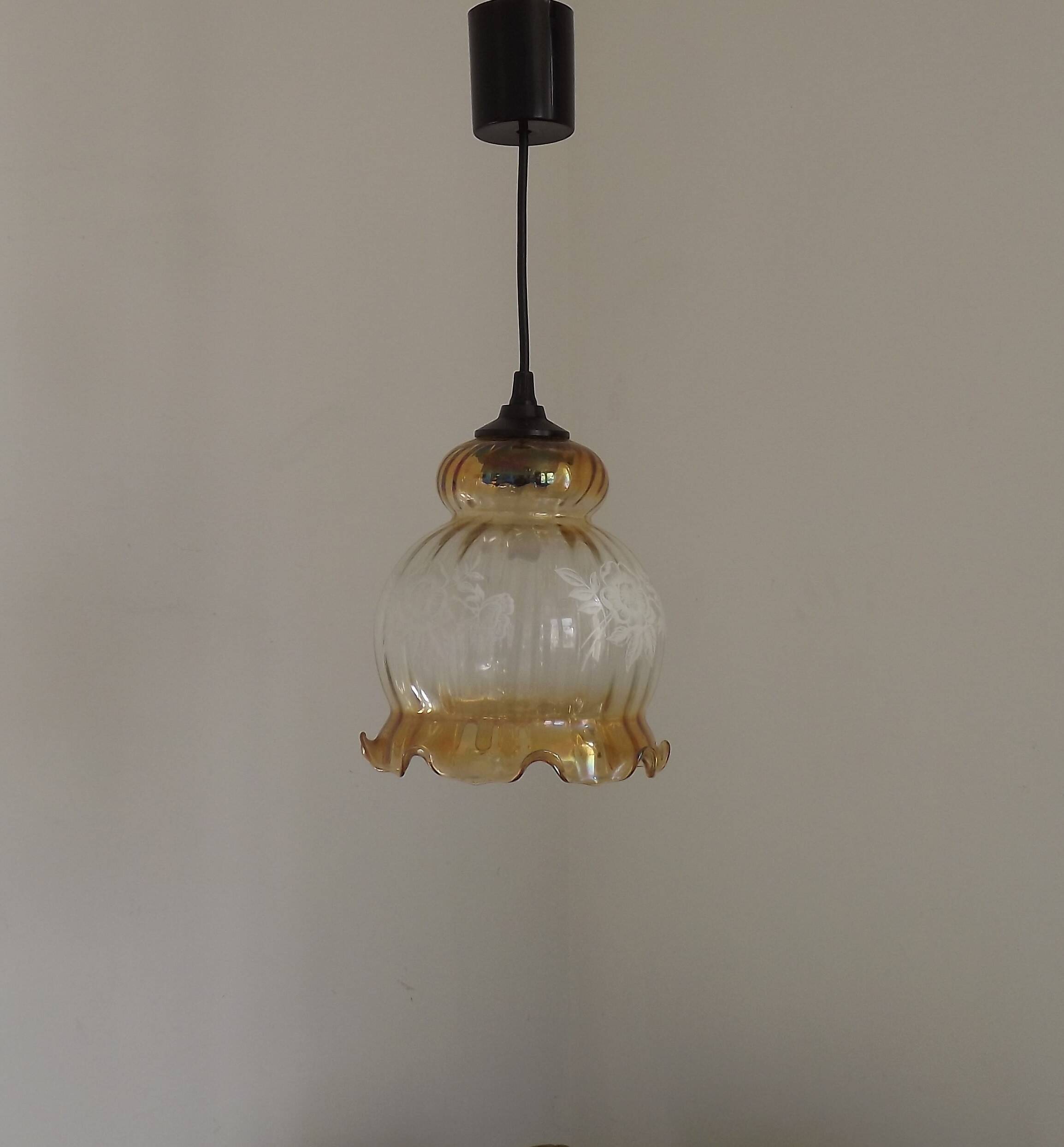 French vintage amber and clear glass ceiling light with white floral decoration.