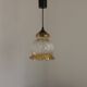 French vintage amber and clear glass ceiling light with white floral decoration.