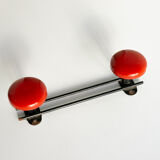 Black and red patère