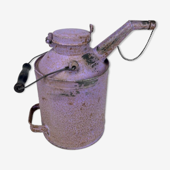 Old oil can with spout and handle