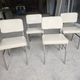 4 chrome metal chairs with faux leather from the 1970s.