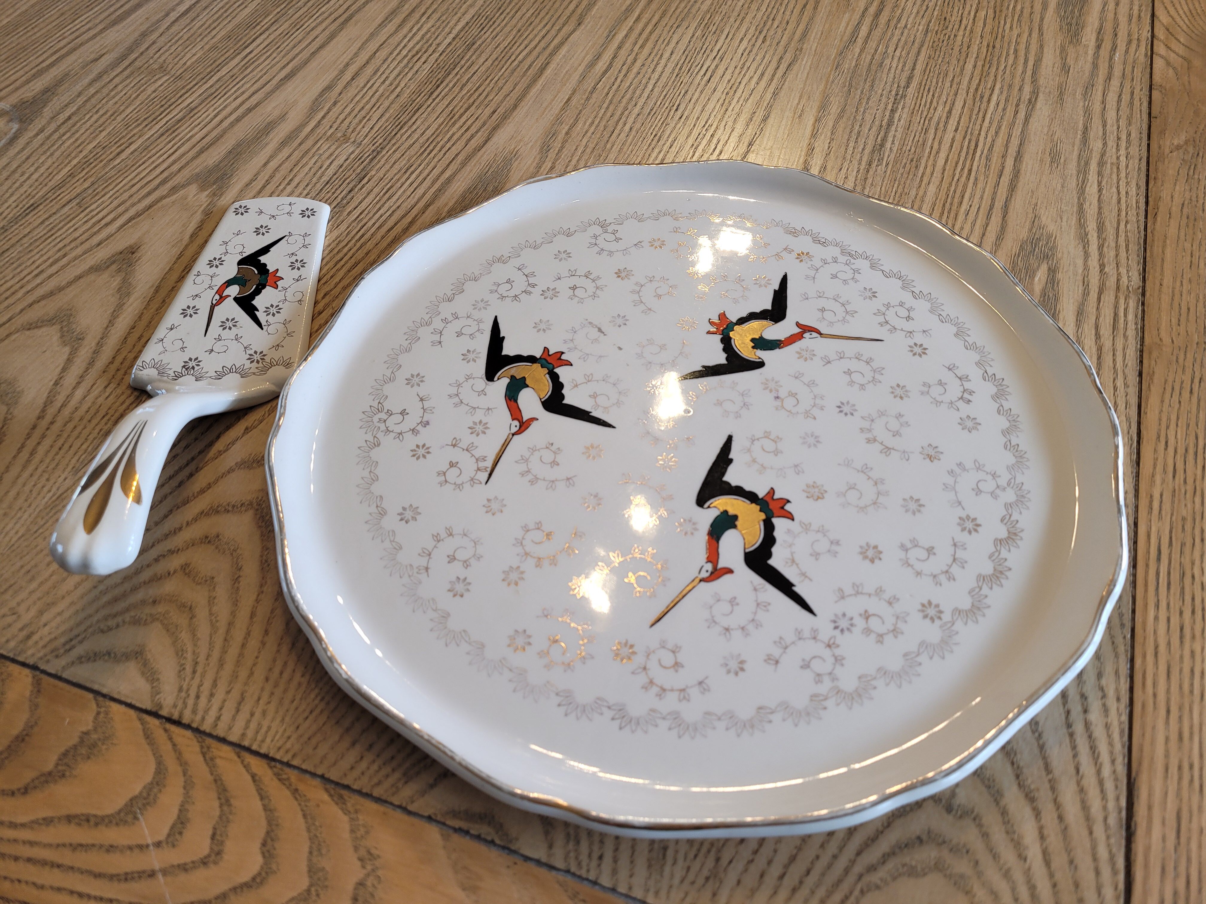 Longwy flat and porcelain pie shovel stork pattern