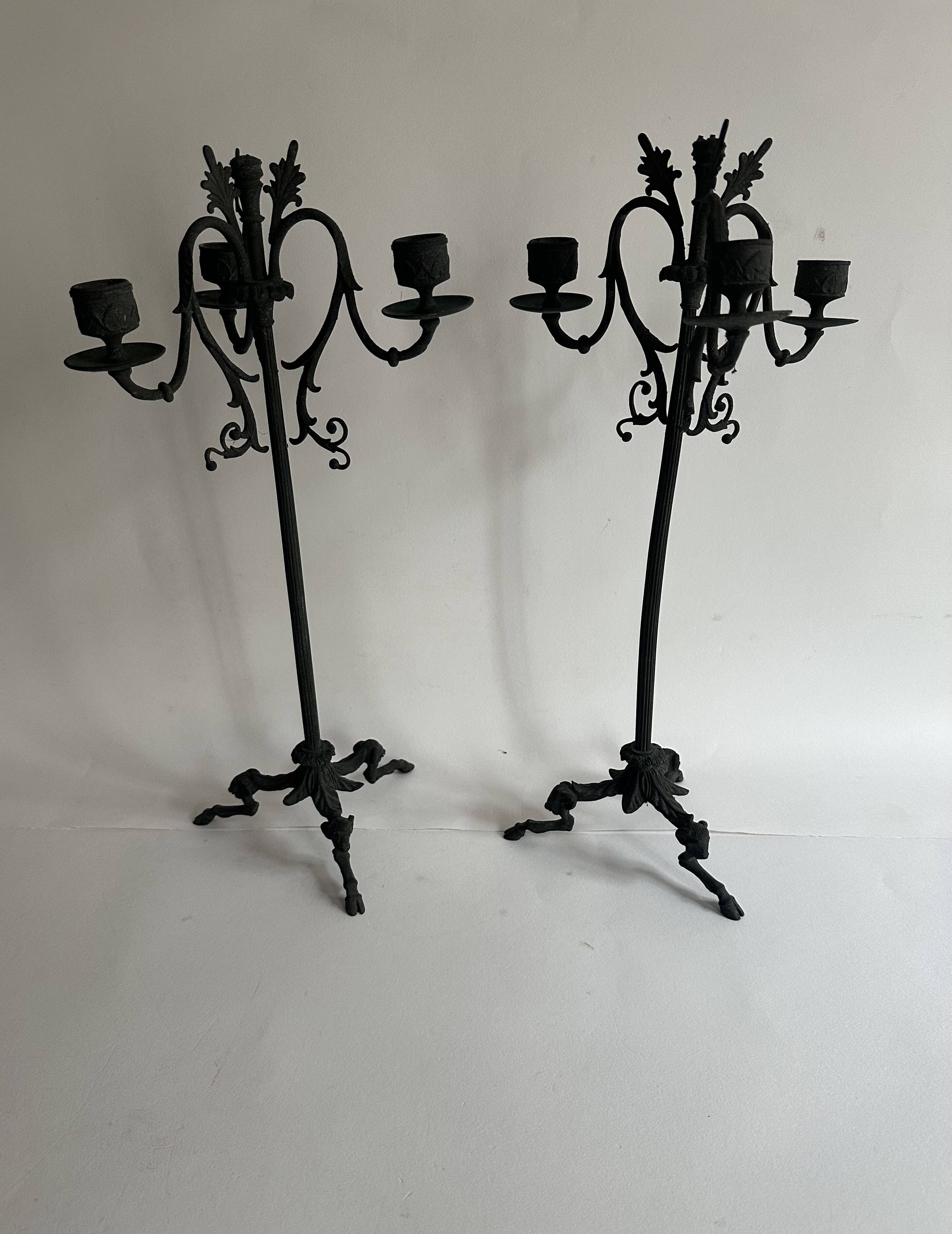 Pair of large Napoleon III candlesticks in patinated bronze