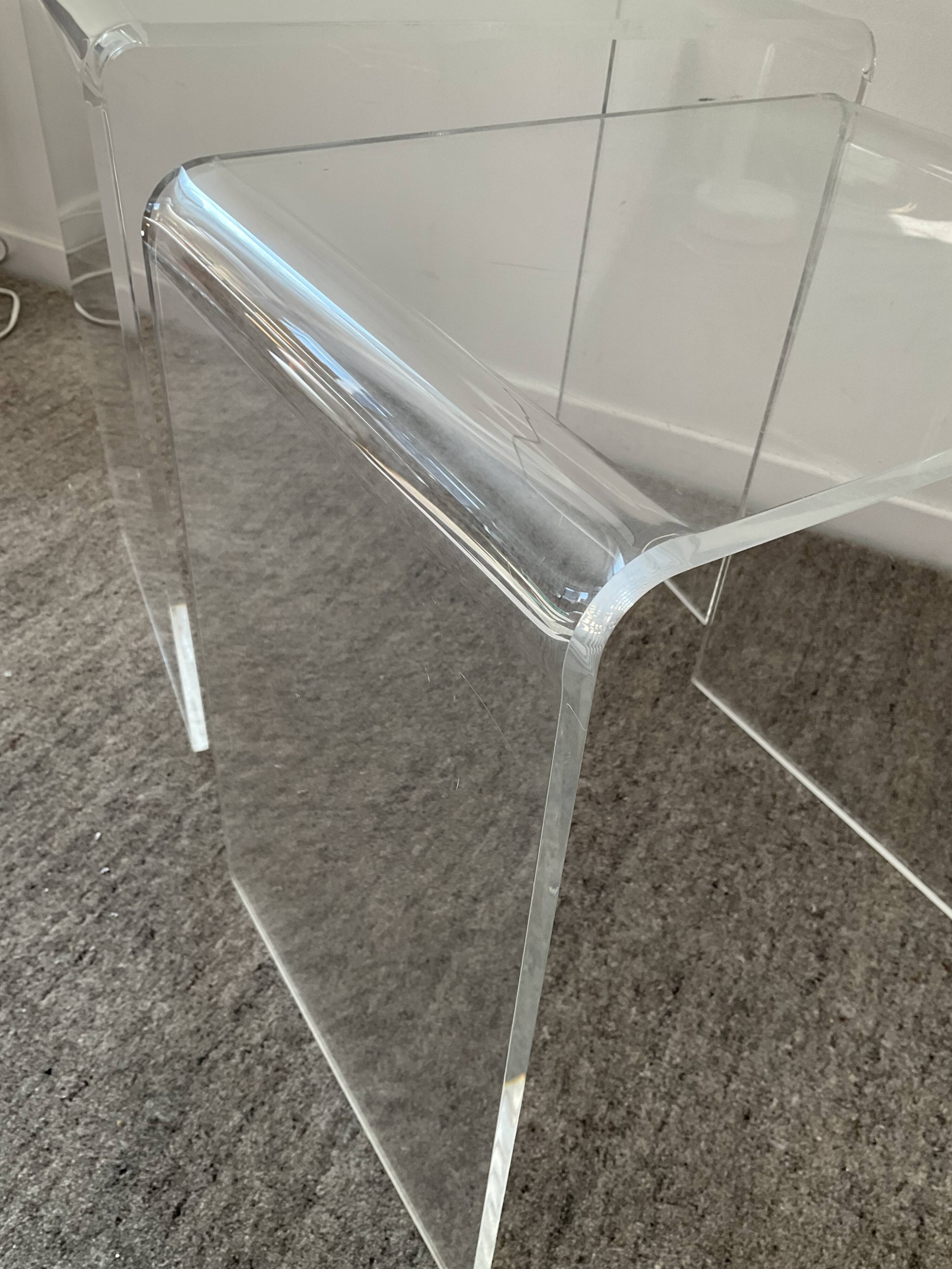 Duo of pull-out tables in plexiglass 70s