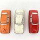3 old small tin circuit cars with lead wheels • Vintage • 1960s