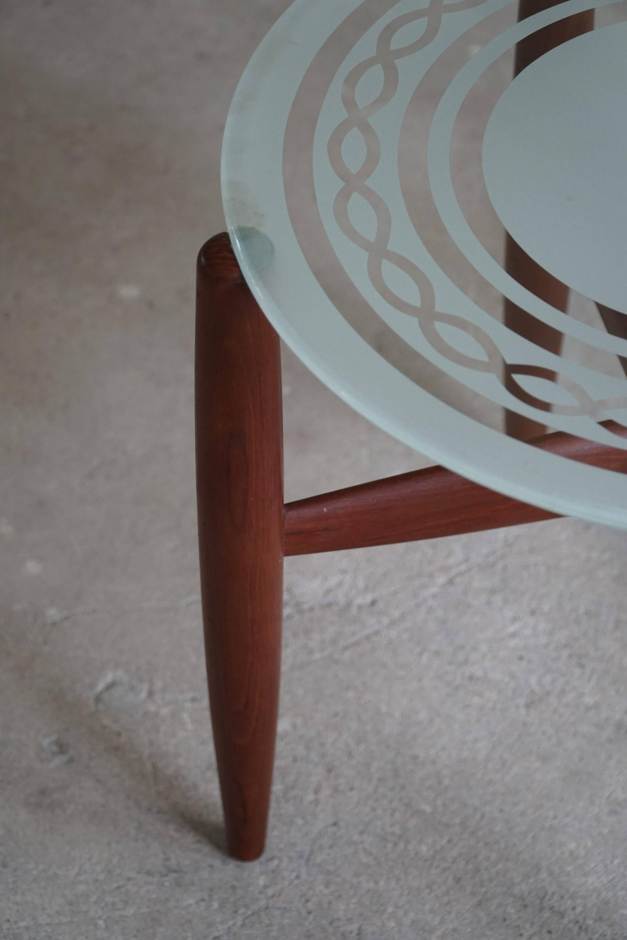 Teak and glass side table, mid-century Danish design, made in the 1960s.