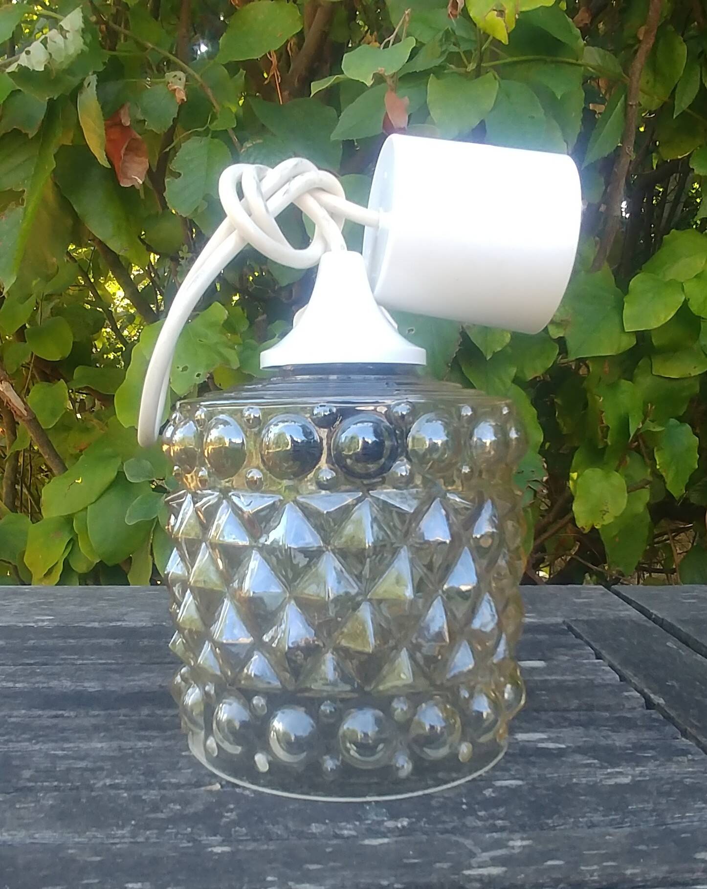A 70s-vintage amber molded glass "bubble" pendant/lamp