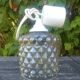 A 70s-vintage amber molded glass "bubble" pendant/lamp