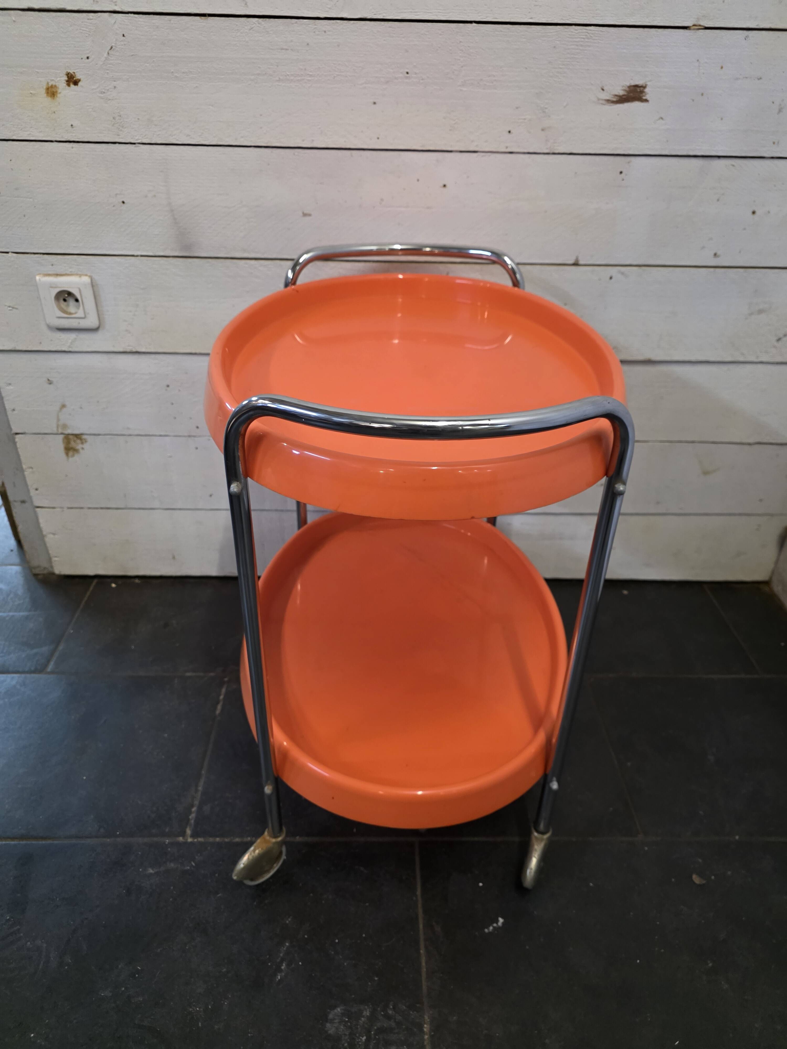 Orange rolling trolley from the 70s